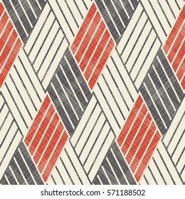 Abstract wattled seamless pattern on texture background in retro colors. Endless geometric  pattern can be used for ceramic tile, wallpaper, linoleum, textile, web page background