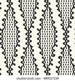 Abstract waves and dots motif. Seamless pattern.