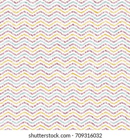 Abstract wavy texture. Scratched seamless pattern. Yellow, pink and blue waves. Pastel colors. Plain backdrop for decoration, wallpaper, web page.