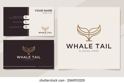 Abstract whale tail logo in gold luxury style and business card design template 