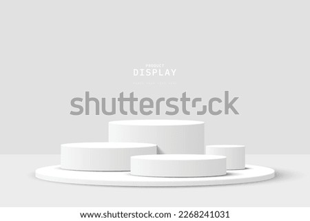 Abstract white 3D room with set of realistic grey white cylinder pedestal podium. Minimal scene for product display presentation. Geometric forms design. Round stage for showcase.