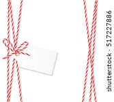 Abstract white background with tag label tied up with red rope bakers twine bow and ribbons