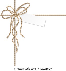 Abstract white background with tag label tied up with rope bakers twine bow and ribbons