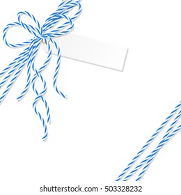 Abstract white background with tag label tied up with blue rope bakers twine bow and ribbons