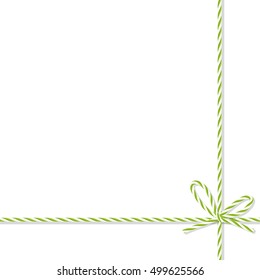 Abstract white background tied up with green rope bakers twine bow and ribbons