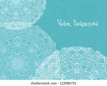 Abstract white and blue doily background