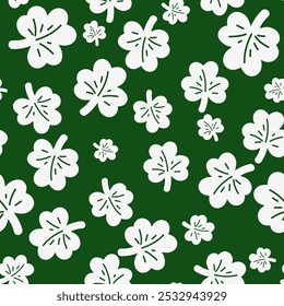 Abstract white clover leaf silhouette print on green background. Seamless pattern with clover leaves. Decorative wallpaper for St Patrick's day holiday design. Vector stock illustration.