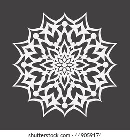 Abstract white flower on a black background..Ornament pattern.Decorative element.
