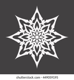 Abstract white flower on a black background..Ornament pattern.Decorative element.