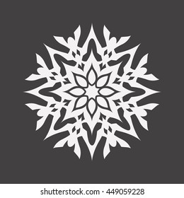 Abstract white flower on a black background..Ornament pattern.Decorative element.