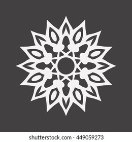 Abstract white flower on a black background..Ornament pattern.Decorative element.