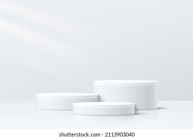 Abstract white and gray 3D room with set of realistic white cylinder pedestal podium. Minimal scene for product display presentation. Geometric platform design. Stage for showcase. Vector llustration