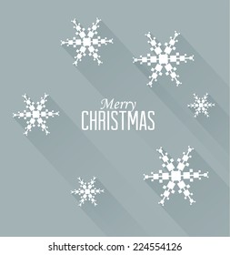 Abstract white snowflakes on a blue background