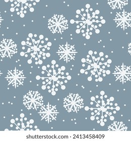 Resumen de copos de nieve blancos sobre fondo gris. Patrón invernal sin fisuras para tela, textil, papel envolvente, etc.