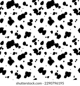 Abstract wild animal skin seamless pattern. Hand drawn vector black spots, blots and splotches. Dalmatian animal seamless pattern. Grunge irregular abstract texture with random hand drawn spots.