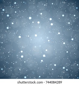 Abstract winter background with falling snowflakes