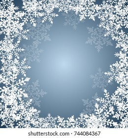 Abstract winter background with falling snowflakes