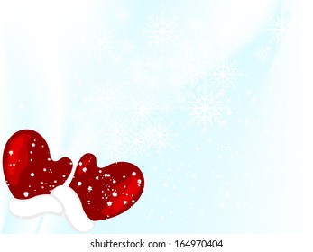 Abstract winter background with gloves and snowflakes