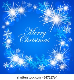 Abstract winter background with glowing stars and snow