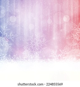 Abstract winter background in shades of blue, red and purple tones. Light effects, snowfall big snow flakes give it a dreamy and festive winter Christmas feel. Space for your text.