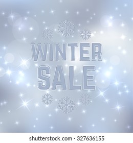 Abstract winter background with snowflakes and sparkles, glitter. 