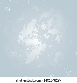 Abstract winter background texture in silver blue with a white glow in the center.