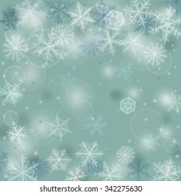 Abstract winter background with various snowflakes.