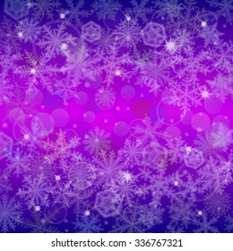 Abstract winter color bokeh  background with snowflakes.