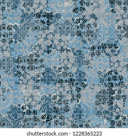 Abstract winter pattern. Fireworks on the background of a winter texture.
