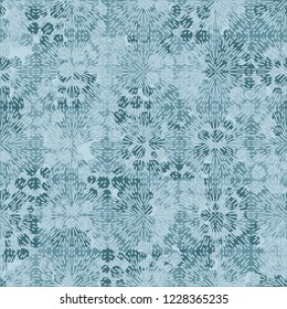 Abstract winter pattern. Fireworks on the background of a winter texture.