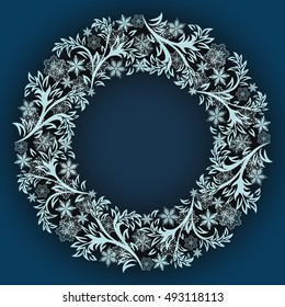 Abstract winter snowflake frame vector template. Blue and white round ornamental frame for Christmas card design.