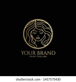 abstract women's face and hair logo template luxury in gold color