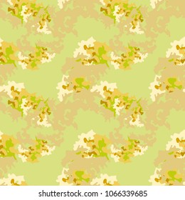 Abstract yellow, beige and green background as spring camouflage. Seamless repeat bright pattern usable as camo, wallpaper, backdrop or for print for textile or wrapping paper