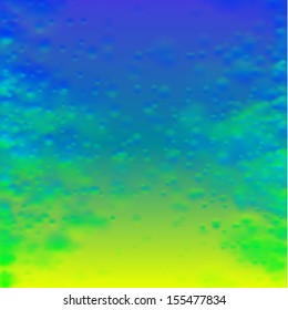 Abstract yellow-green-blue background with blurry bubbles