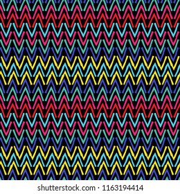 Abstract zigzag seamless background-vector illustration. Curved lines symmetrically located in the tribal style. Hand-drawn.
