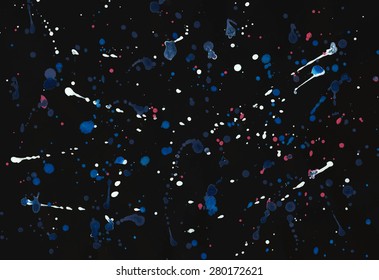 Abstraction on a black background, drops of white, blue, pink and purple flowers.