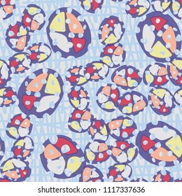 Abstraction. Seamless color pattern made up of multi-colored rounded elements with holes. Under the picture is a background consisting of broken into unequal pieces of squares.
