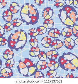 Abstraction. Seamless color pattern made up of multi-colored rounded elements with holes. The background of the picture is a network of square cells divided into fragments.