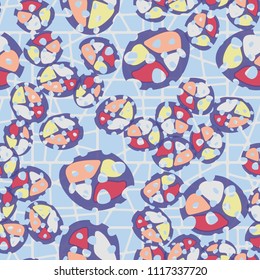 Abstraction. Seamless color pattern made up of multi-colored rounded elements with holes. The background of the picture is a network of square cells divided into fragments.