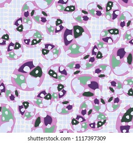 Abstraction. Seamless color pattern made up of multi-colored rounded elements with holes. Under the picture there is a background consisting of broken ovals organized into squares.