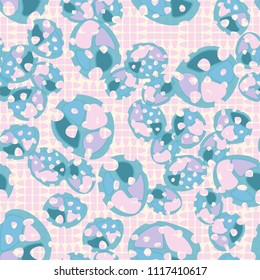 Abstraction. Seamless color pattern made up of multi-colored rounded elements with holes. Under the picture there is a background consisting of broken ovals organized into squares.