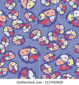 Abstraction. Seamless color pattern made up of multi-colored rounded elements with holes. Under the picture there is a background consisting of diagonally striped squares.