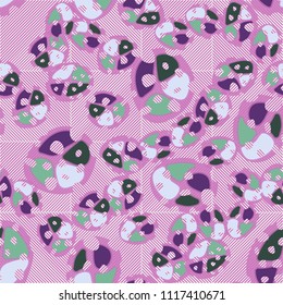 Abstraction. Seamless color pattern made up of multi-colored rounded elements with holes. Under the picture there is a background consisting of diagonally striped squares.