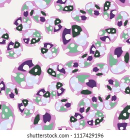 Abstraction. Seamless color pattern made up of multi-colored rounded elements with holes.
