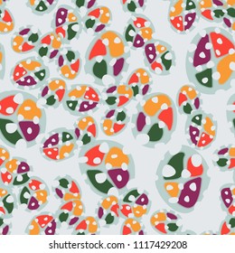 Abstraction. Seamless color pattern made up of multi-colored rounded elements with holes.