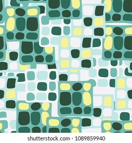 Abstraction. Uneven colored spotted squares. Random order. Fashionable background. Stylish Wallpaper. Seamless texture.