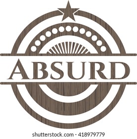 Absurd badge with wooden background