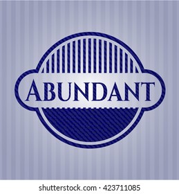 Abundant emblem with jean background