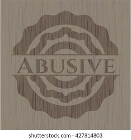 Abusive vintage wooden emblem