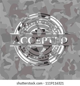 Accepted on grey camo texture